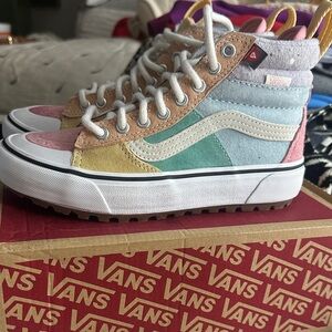 Vans women’s Multicolor High-Top Sneakers